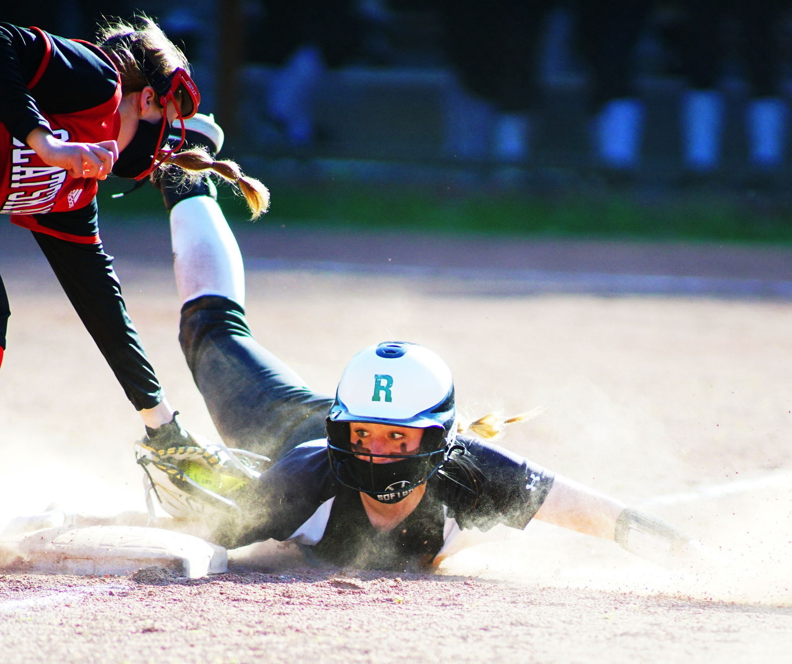 Reese Schimmel slides Rainier softball